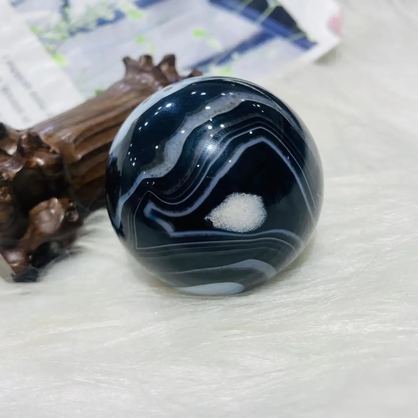Black onyx sphere detail - shine and polish