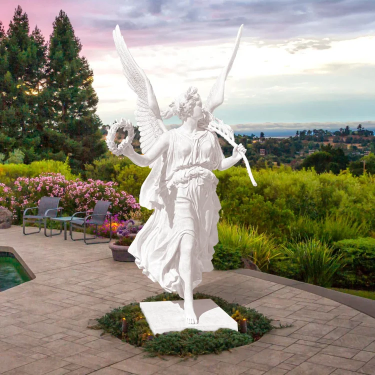 A white bronze statue of the goddess of victory, holding a palm branch and a laurel wreath