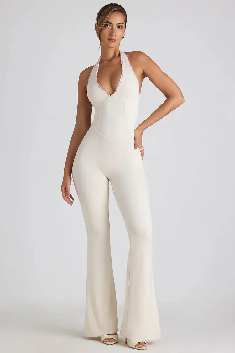 Elegant Black Jumpsuit for Women with Open Back and Halter Neck &acirc;&euro;&ldquo; Flattering Bodycon Fit for Special Occasions