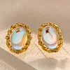 Oval Twist Flashing Design Copper Gold Plated Earrings