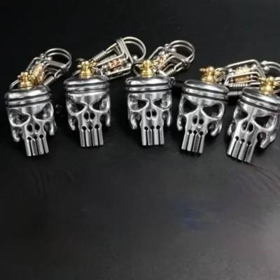 Piston art skull keychain