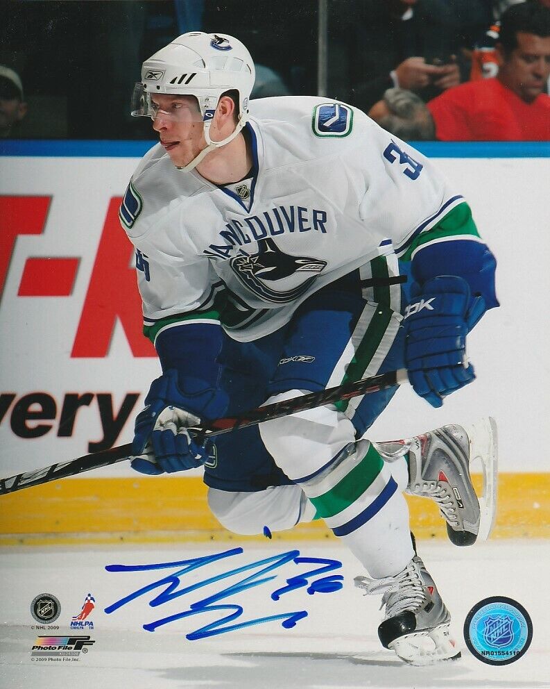 JANNIK HANSEN SIGNED VANCOUVER CANUCKS 8x10 Photo Poster painting #1 Autograph