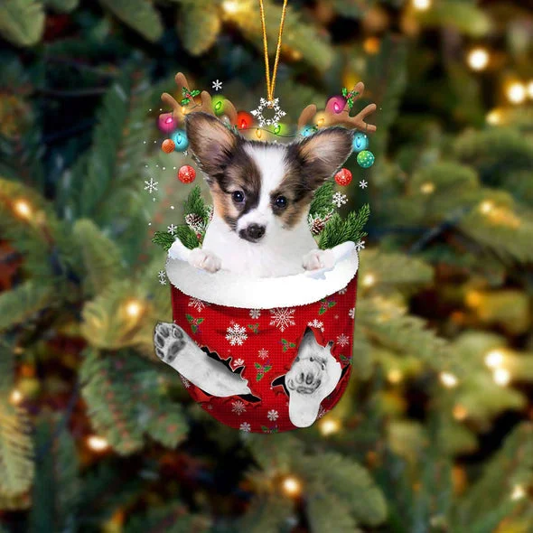 Papillon In Snow Pocket Christmas Ornament.