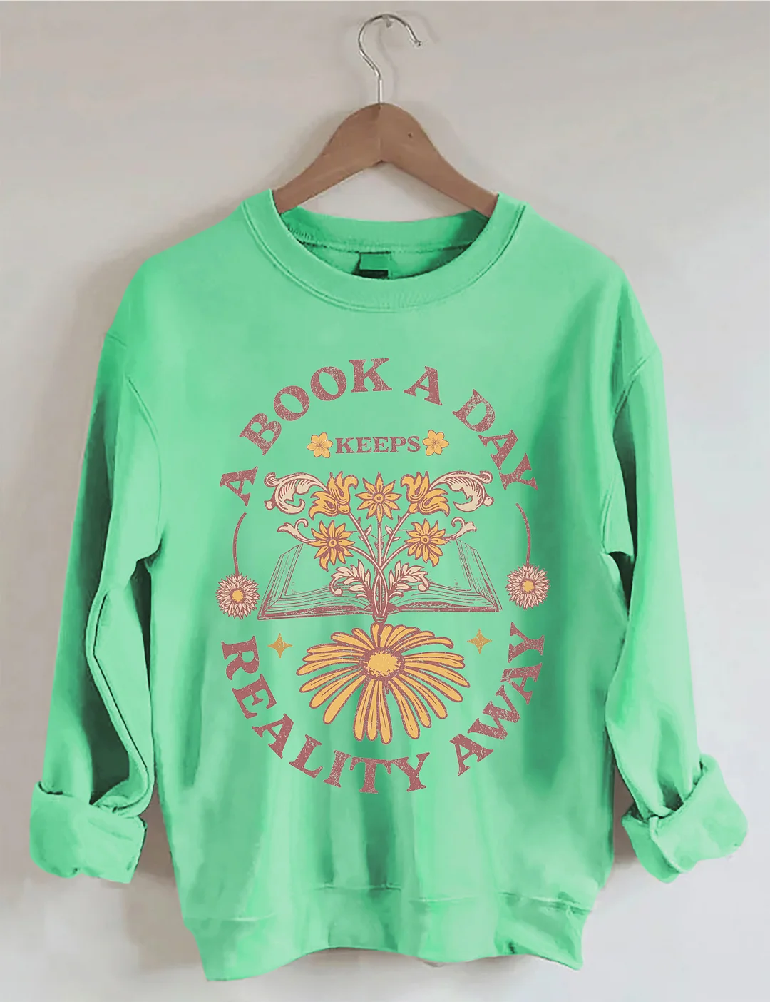 A Book A Day Keeps Reality Away Sweatshirt
