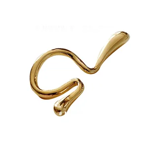 Golden twisted ear clip jewelry (no piercing required)