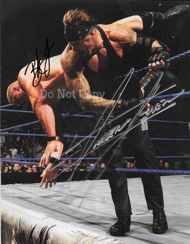 The Undertaker & Brock Lesnar Signed Photo Poster painting 8x10 rp Autographed WWE WWF Wrestling