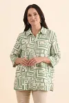 Front view of women's grass green geometric maze print shirt with 3/4 sleeves and button-down collar
