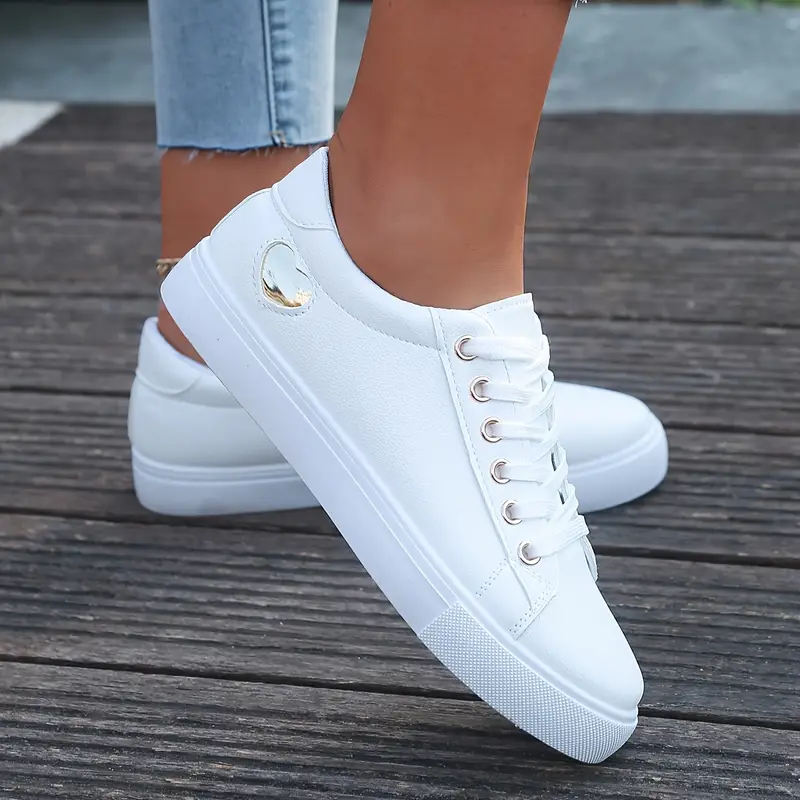 womens white low top sneakers comfortable lace up casual shoes with golden accents rubber sole for all day wear   running yoga casual attire ladies sneakers everyday footwear sleek   fabric lined interior details 1