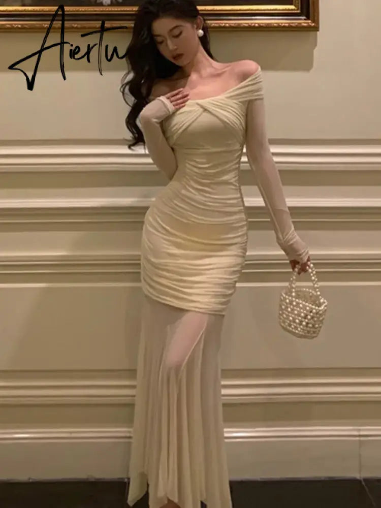 Aiertu Elegant Knitted Dress Women Mesh Patchwork Long Sleeve Slash Neck Wrap Hip Autumn Spring Evening Party Prom Robe Vestidos Mujer Aiertu