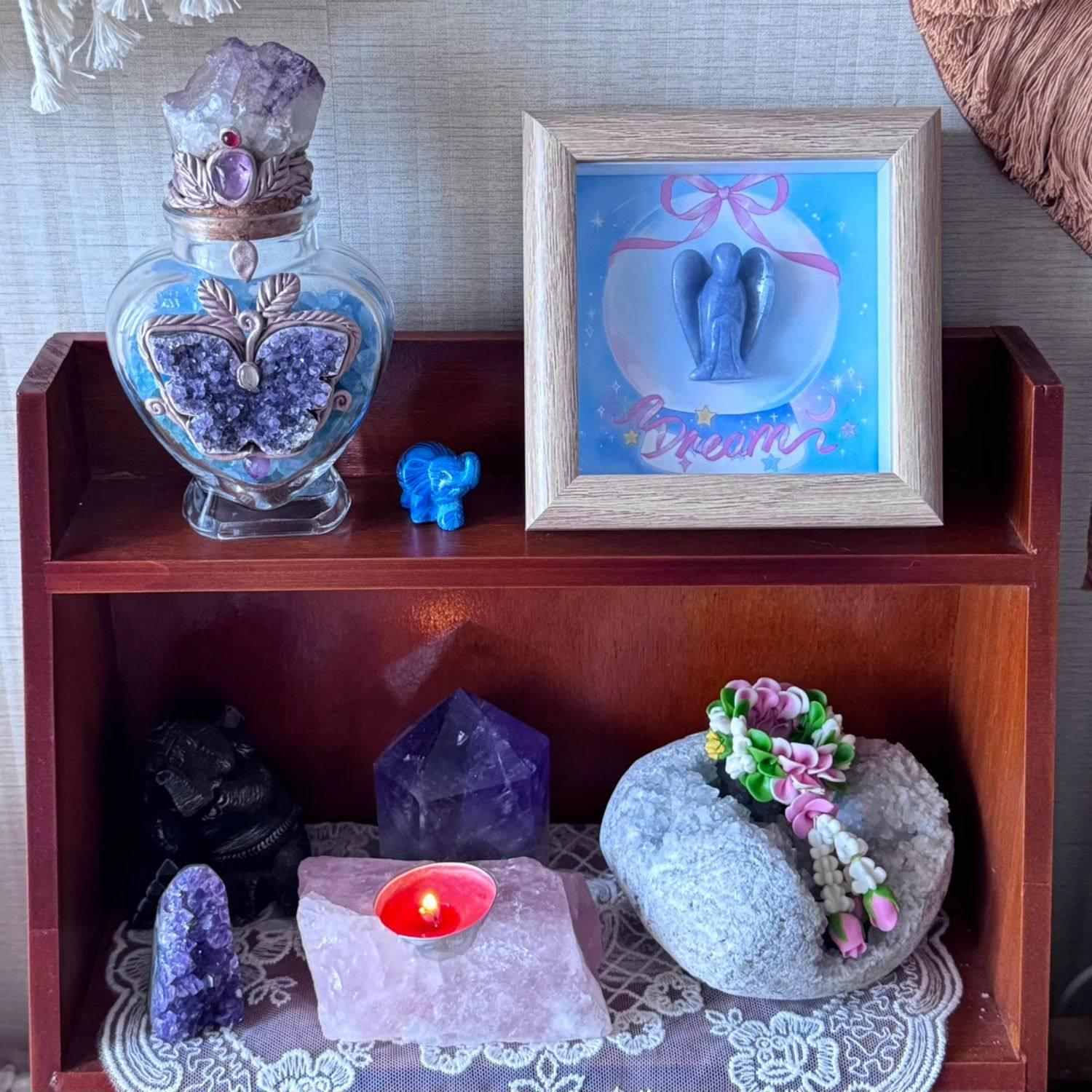 Framed crystal angel decor on shelf or bedside table