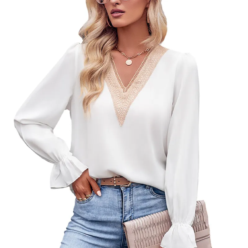 Jeans with white blouse and layered gold jewelry