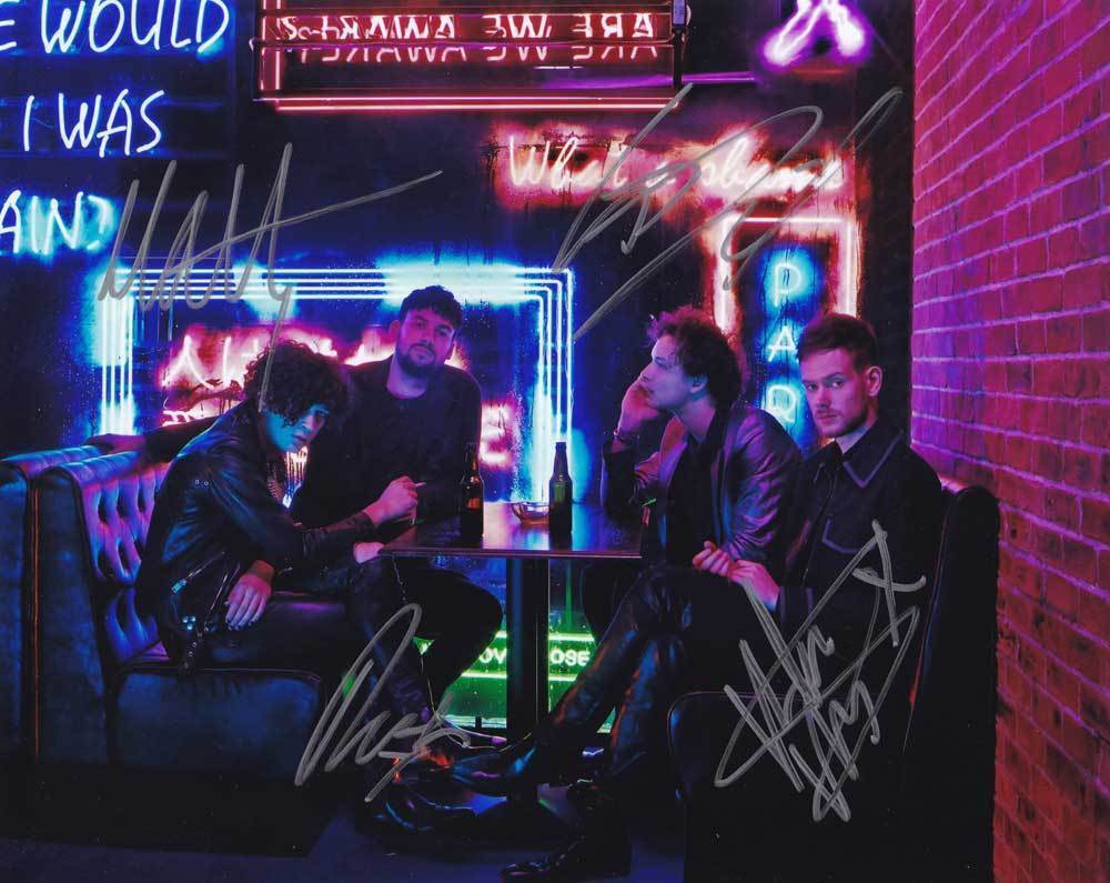 The 1975 In-Person AUTHENTIC Autographed Group Photo Poster painting SHA #76286