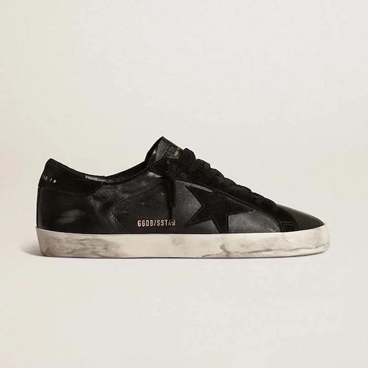 Golden Goose Super-Star Hombre de napa negra con estrella y refuerzo del talón de ante negro