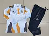 2024/2025 Real Madrid Royal Yellow blue and grey print Half-Pull Training Suit Football Shirt 1:1 Thai Quality Set