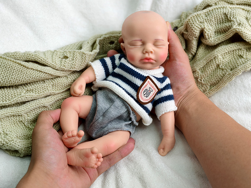 sleeping baby doll boy
