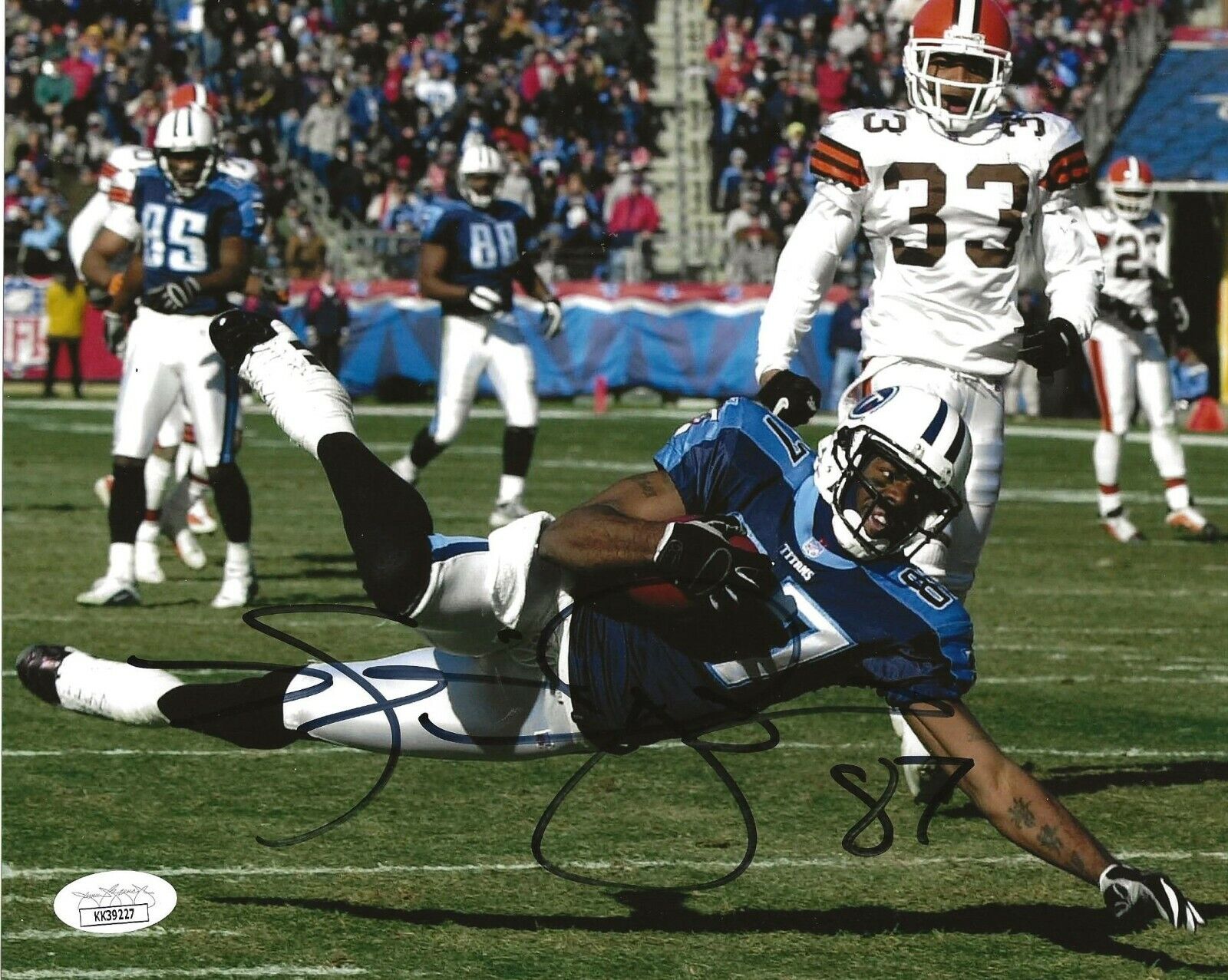 Kevin Dyson signed Tennessee Titans 8x10 Photo Poster painting autographed JSA