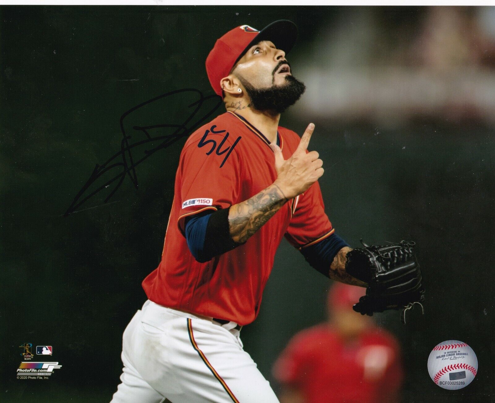 SERGIO ROMO MINNESOTA TWINS ACTION SIGNED 8x10