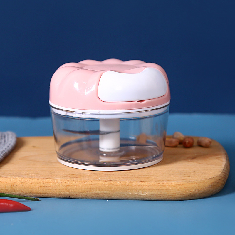 Mini manual garlic grinder