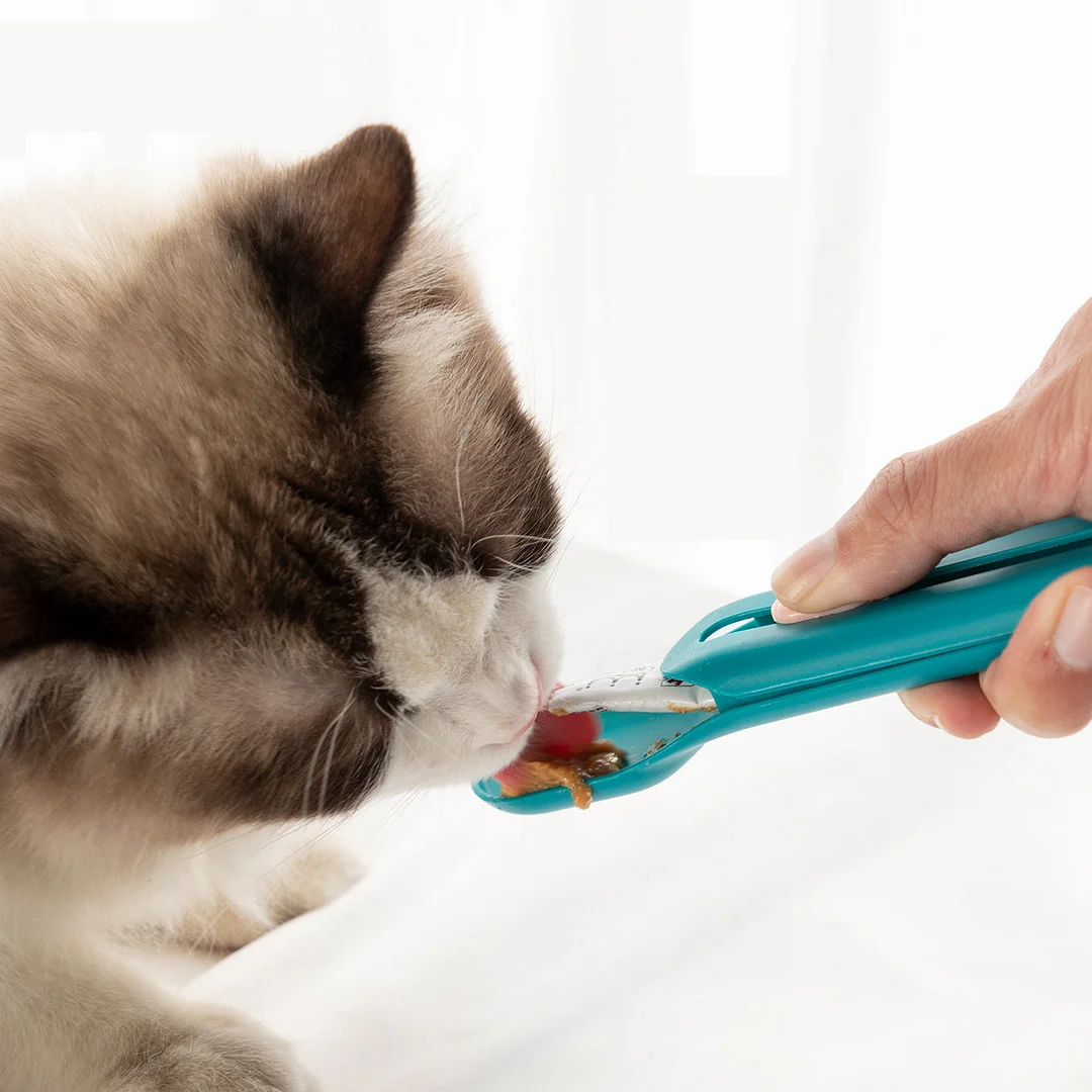 The Hot Cat Strip Spoon Feeder Squeezes Snack