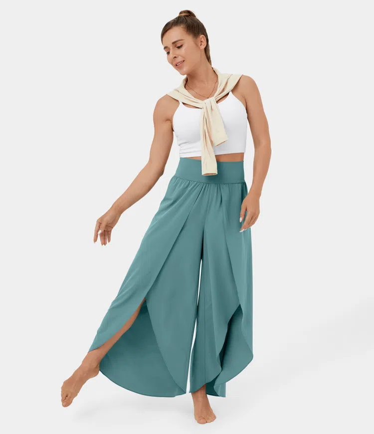 High waisted quick drying palazzo flowy slacks with a split, wide leg and back waist pocket