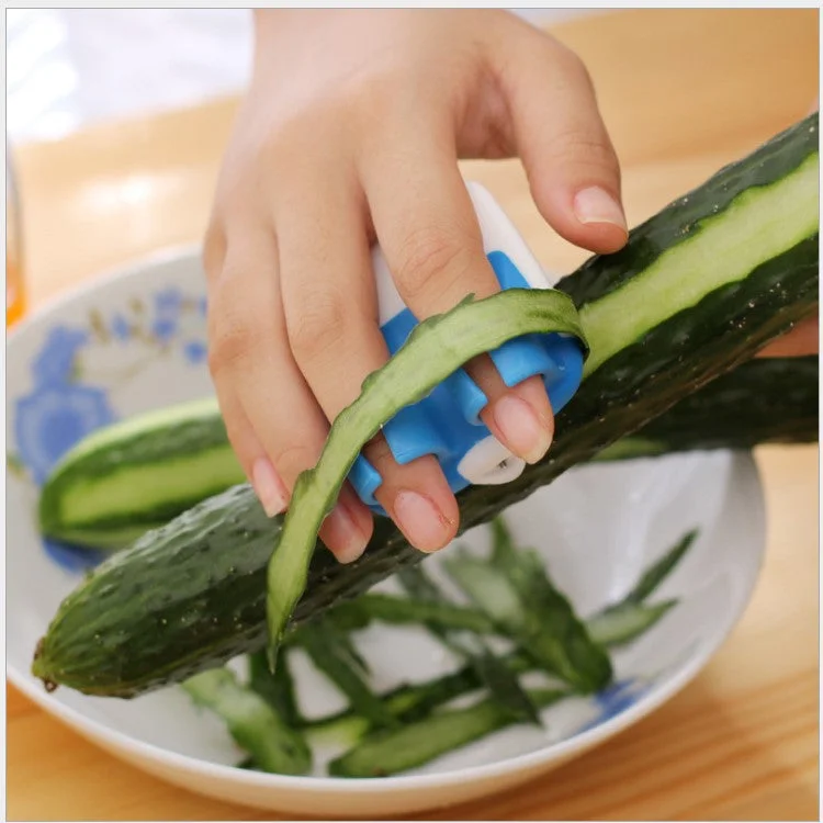 Multifunctional Finger Peeler（Random Color）