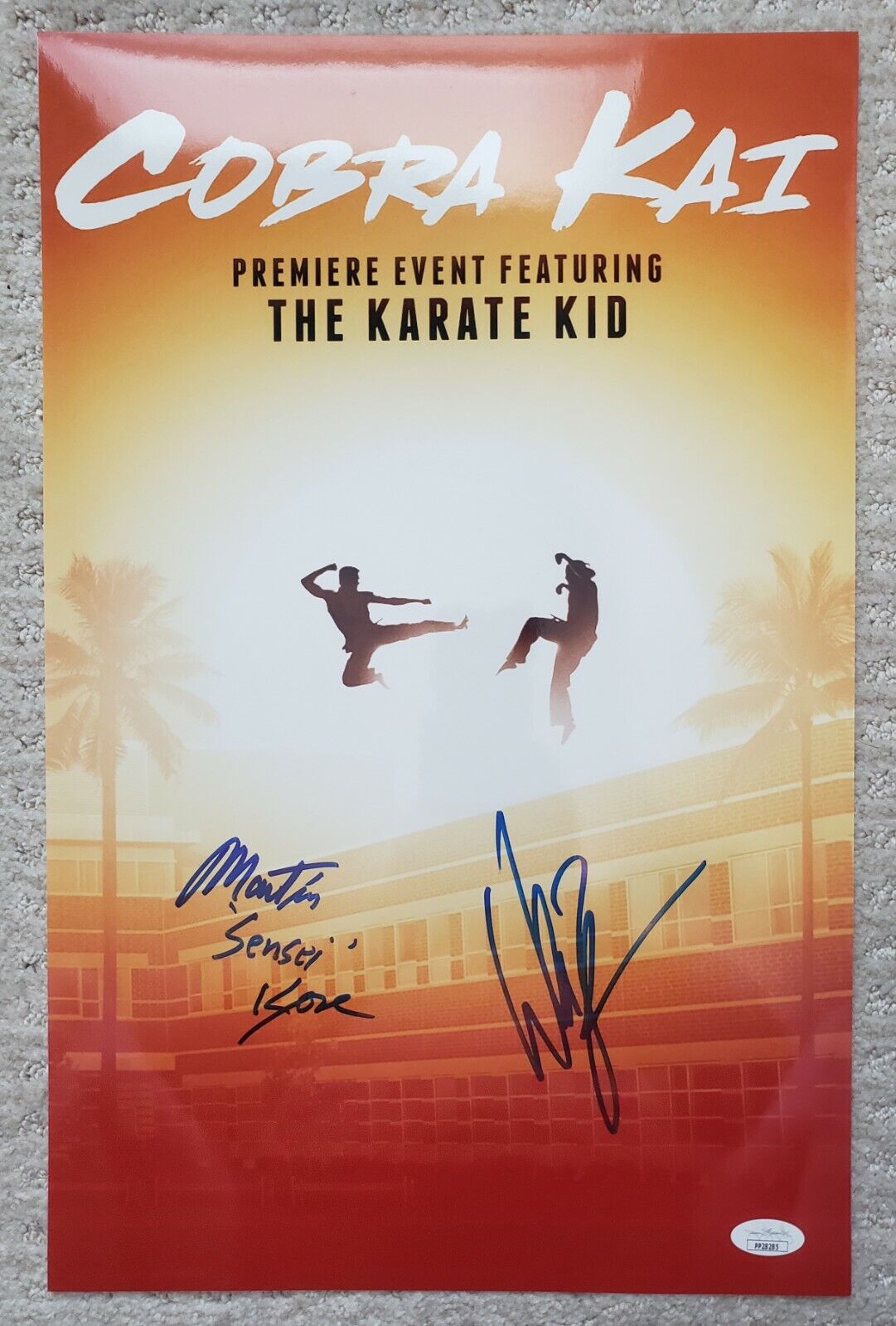 11x17 Cobra Kai Poster signed by William Zabka and Martin Kove. JSA