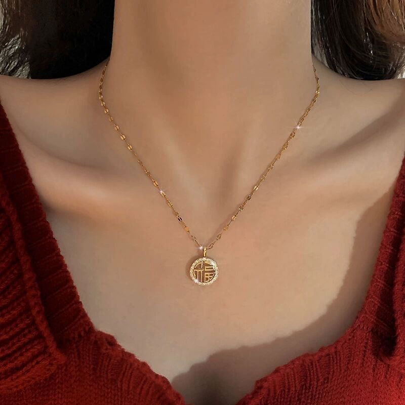 Skeleton Chinese &ldquo;Happiness&rdquo; gold plated necklace