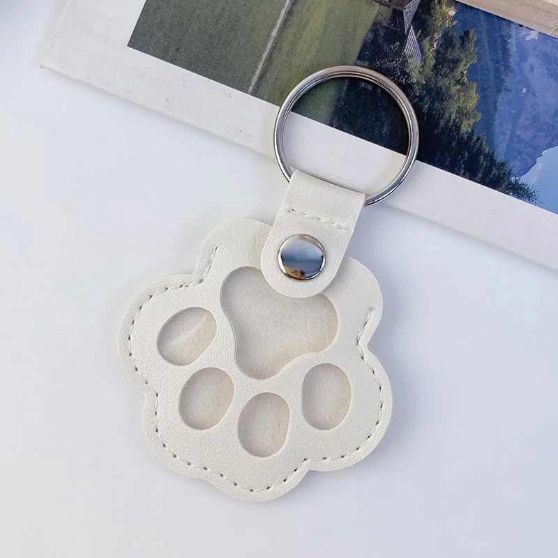 🔥LAST DAY 49% OFF - 🐾Pet Paw Shaped Leather Keychain