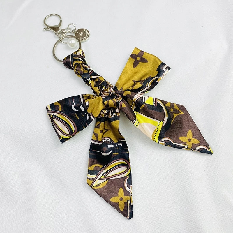 Sweet Minimalist Bow Knot Cloth Metal Unisex Bag Pendant Keychain