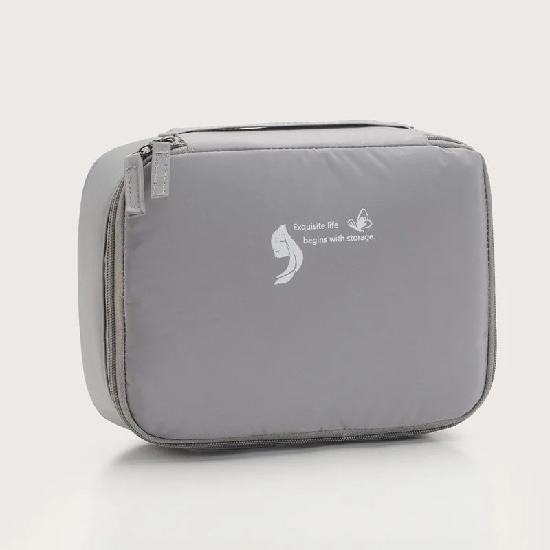 Multifunctional compartmentalized square bag travel storage bag