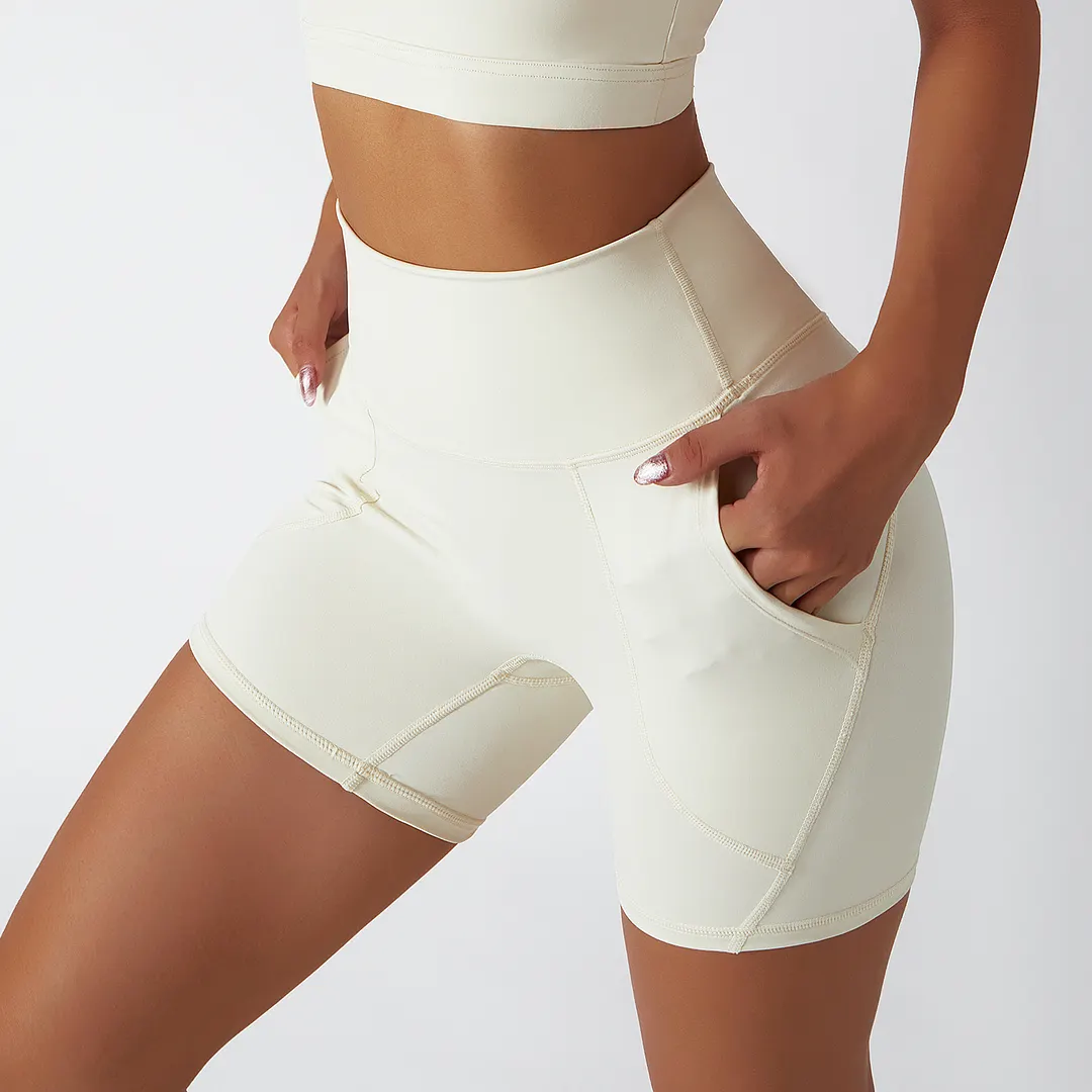 Hergymclothing Cream Apricot renewable fabric sustainable no front seam yoga shorts with side pockets online shopping