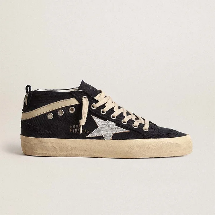 Golden Goose Mid Star de algodón azul con estrella plateada y coma de cuero