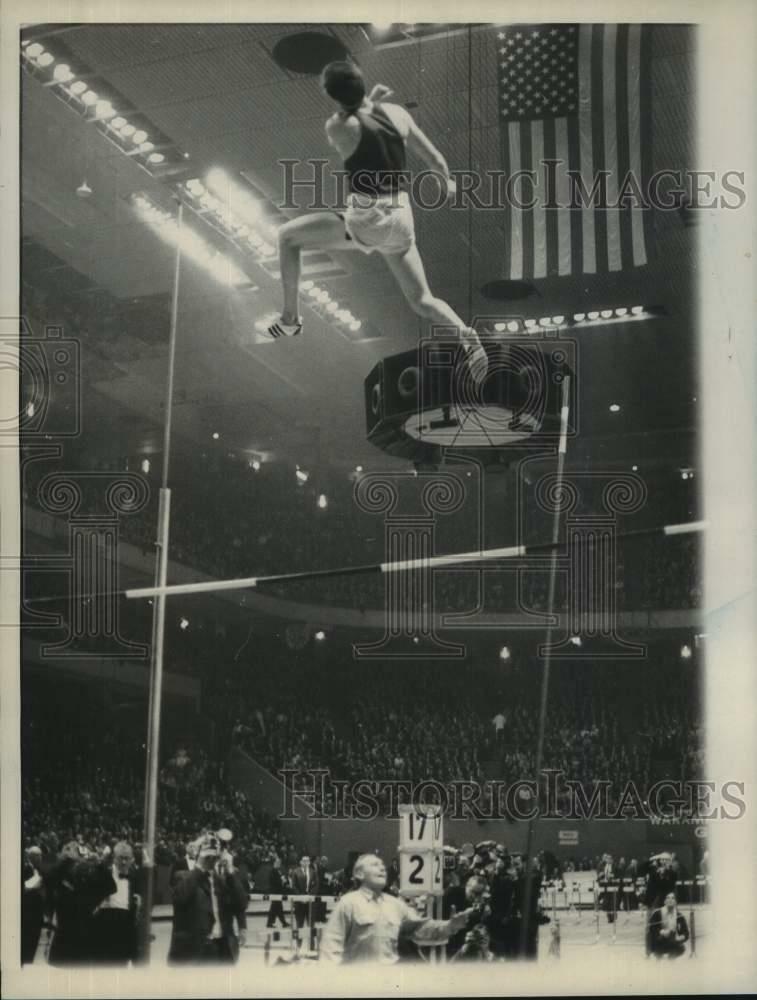 Press Photo Poster painting Bob Seagren, Pole Vaulter, Tries to Clear Bar at Millrose Games