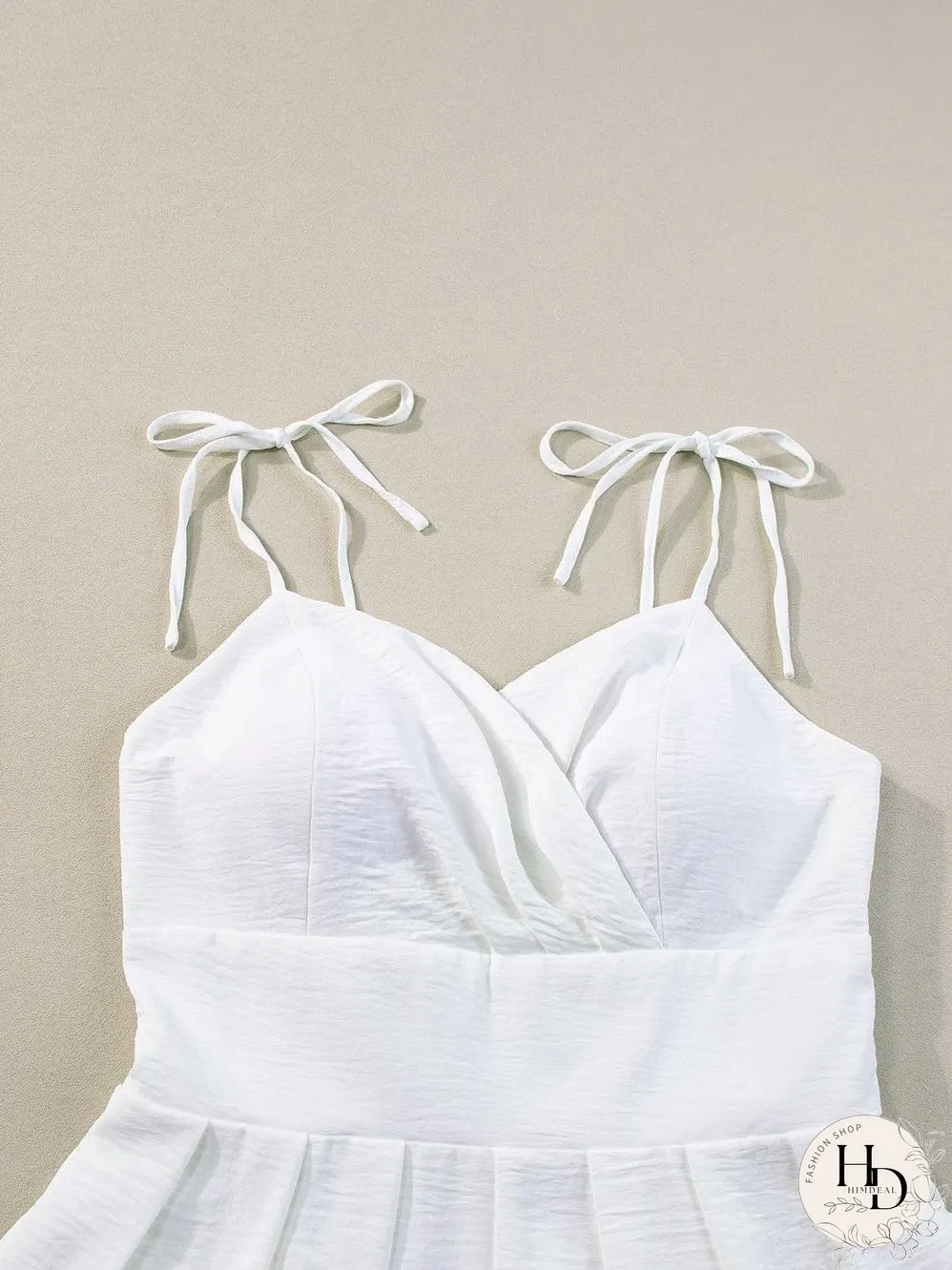 Elegant Beige Pleated Wide Leg Jumpsuit with Spaghetti Straps