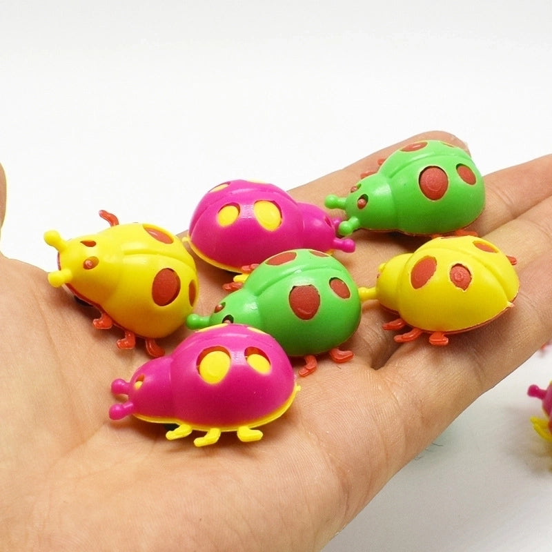 100 Pieces Ladybird Shaped Colorful Capsule Toy With Wheels