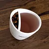 Innovative Tilted Tea Cup With Integrated Filter