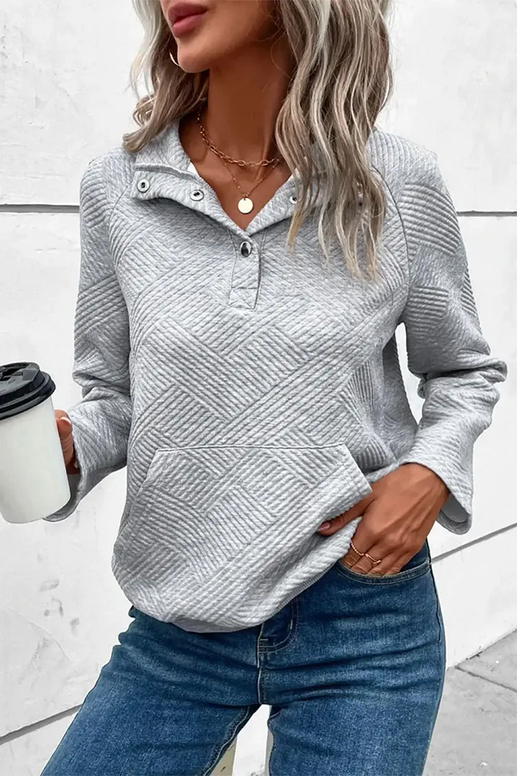 light grey textured buttoned sweatshirt