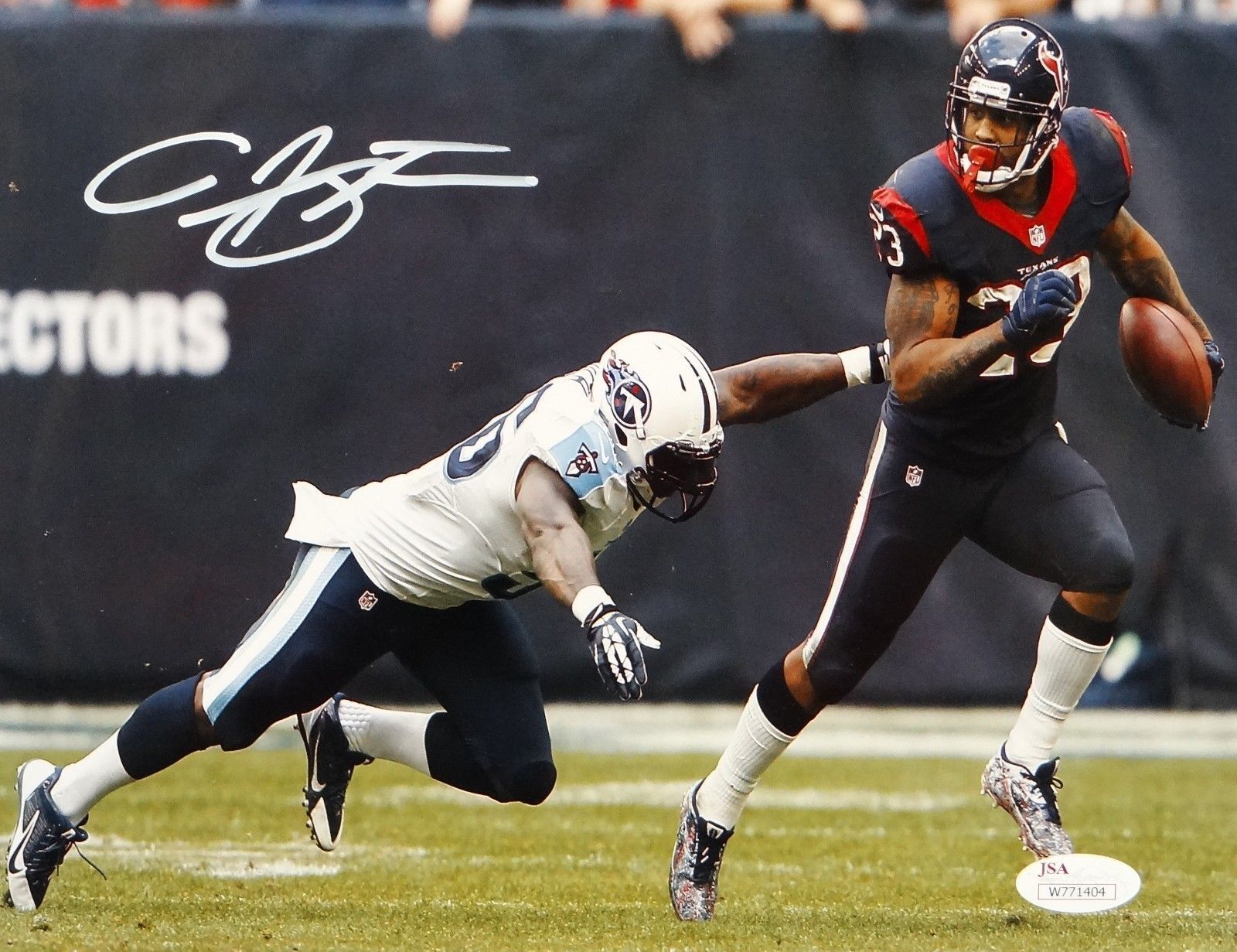 Arian Foster Autographed Texans 8x10 Running Against Titans Photo Poster painting- JSA W Auth