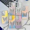 Suitable for Samsung S24 series laser colorful water ripple butterfly bracket protective case (with bracelet)