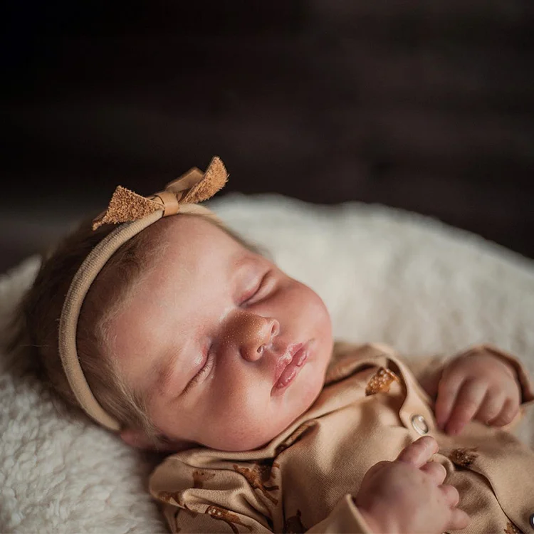 20 Inch Realistic Soft Touch Reborn Female Doll is Sleeping and Her Name is Lucy