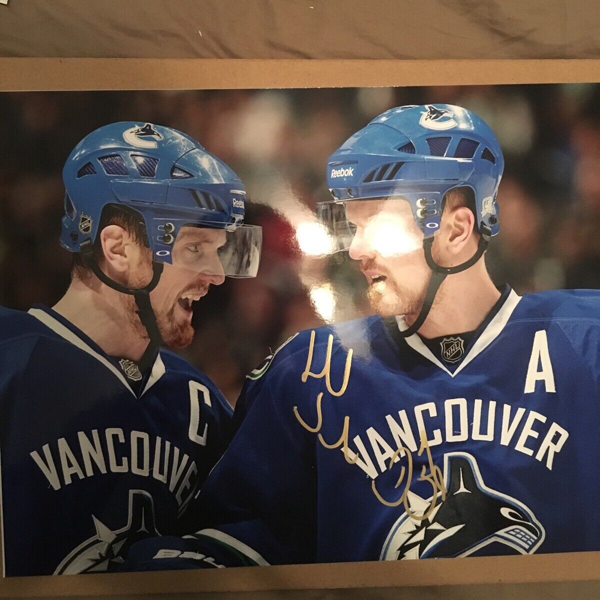 Henrik Sedin And Daniel Sedin autographed 11x14 Vancouver Canucks Dual