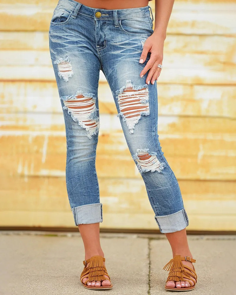 Драные джинсы женские