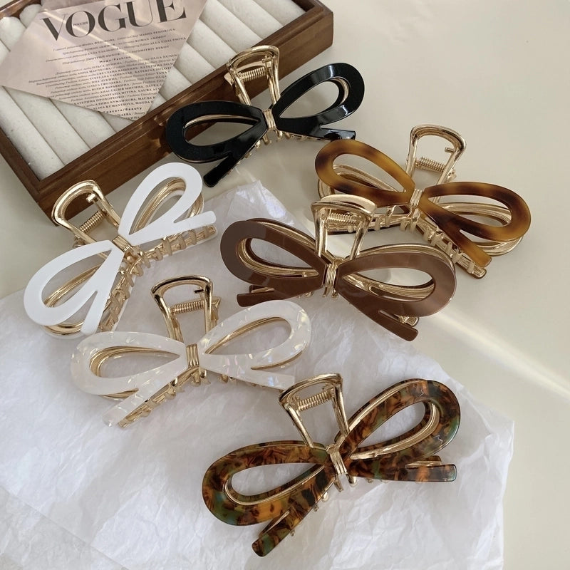 Women’s Classic Style Bow Knot Acetic Acid Sheets Metal Criss Cross Hair Claws