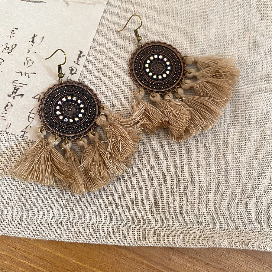 Bohemian style leaf and feather tassel ear hooks ethnic retro niche style earrings light luxury and high-end earrings