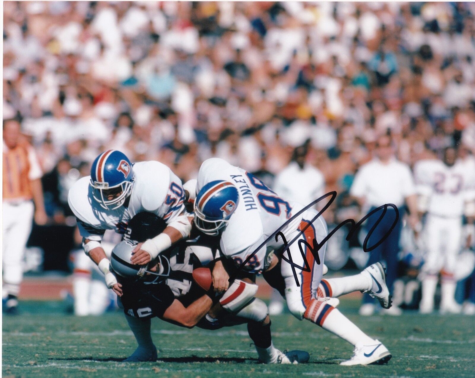 RICKY HUNLEY DENVER BRONCOS ACTION SIGNED 8x10