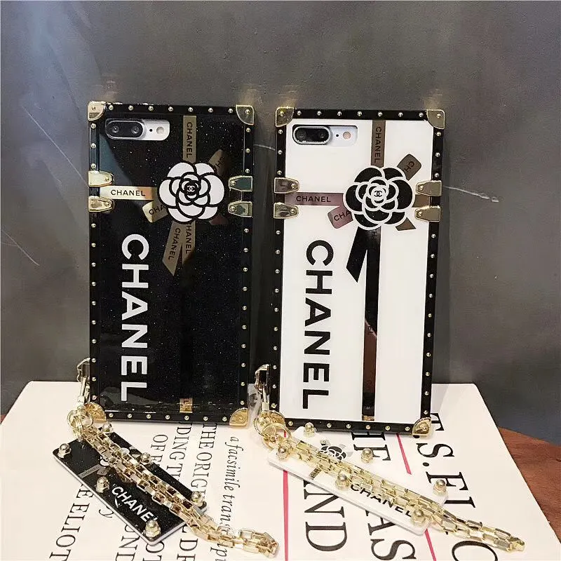 Chanel Trunk Camellia Phone Case | Luxury Charm Tag Cover for iPhone & Samsung