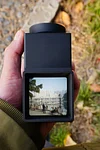 Handheld waist-level viewfinder composition trainer