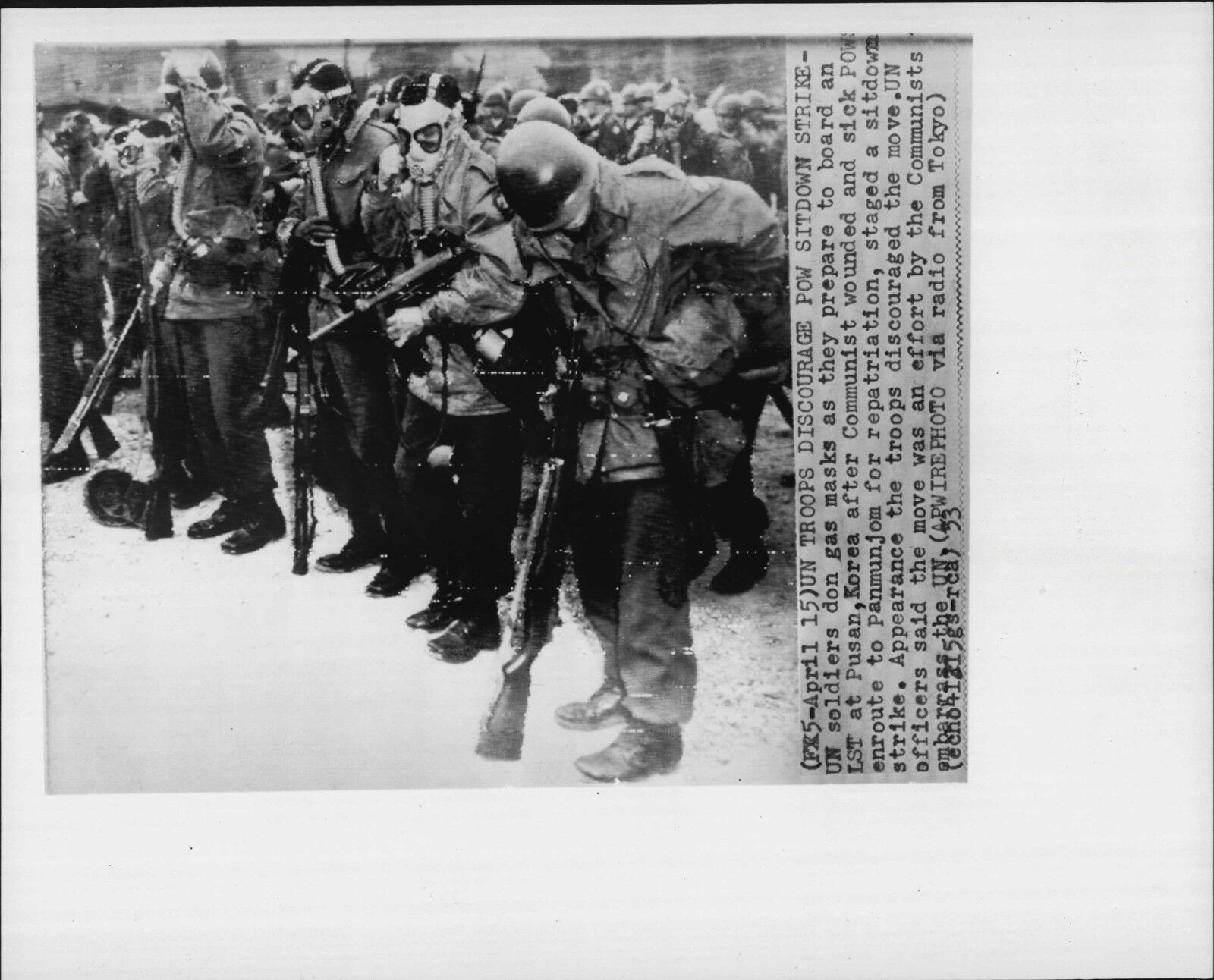 Korea War UN Soldiers Gearing Up for Riot 1953 Press Photo Poster painting