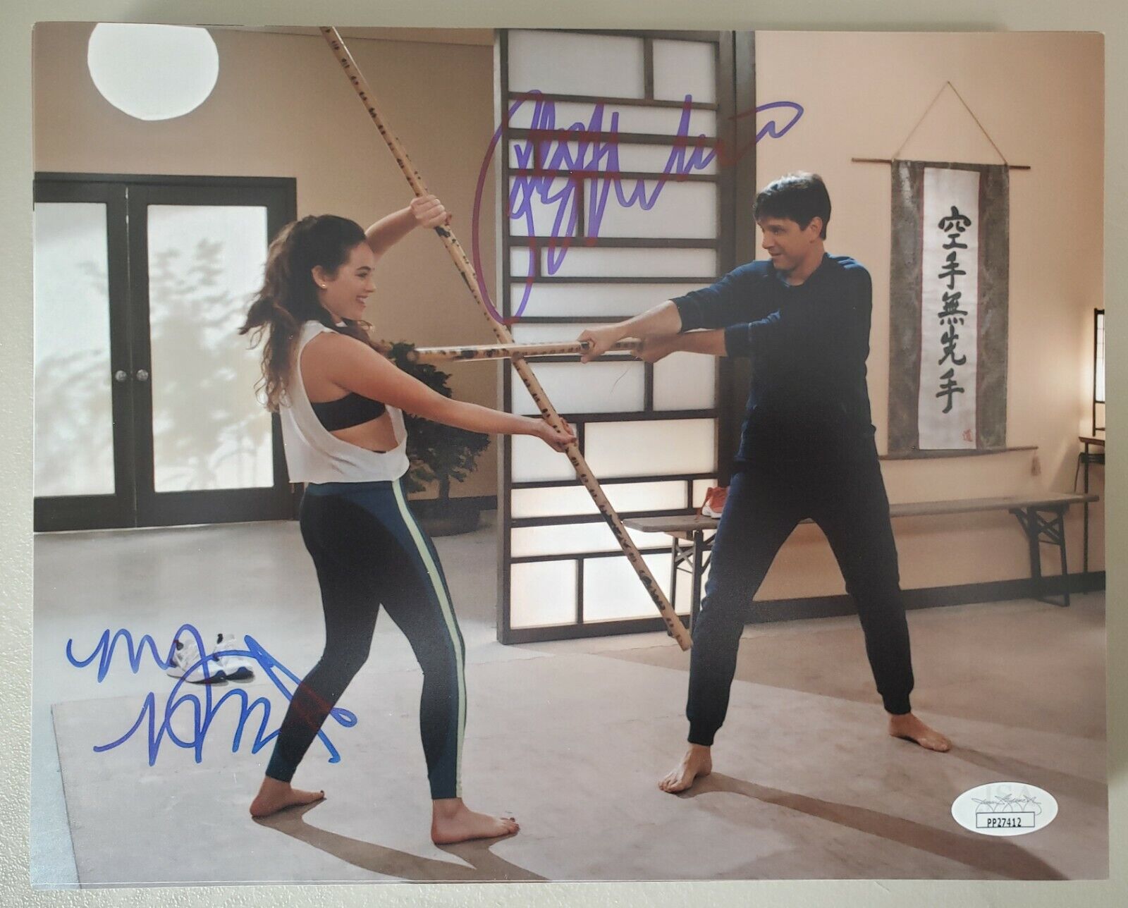 8X10 Autographed by Mary Mouser and Ralph Macchio in Cobra Kai. Rare! JSA