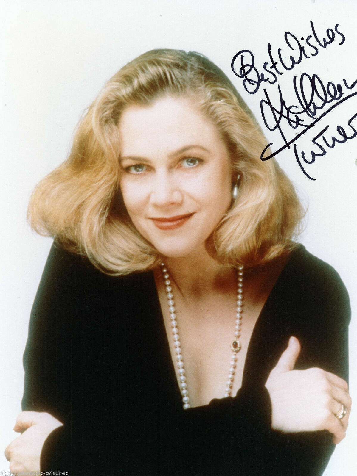 KATHLEEN TURNER AUTOGRAPHED SIGNED 8X10 POSING WITH PEARLS IN BLACK